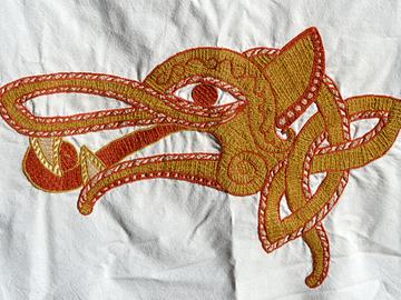 Der fertig gestickte Wolfskopf